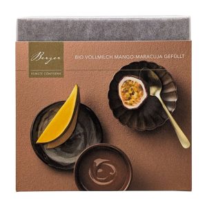 Bio Vollmilchschokolade Confiserie Berger 100 g – Gefüllte Tafel mit Mango-Maracuja-Ganache, 37% Kakao, exotisch und fruchtig-frisch.