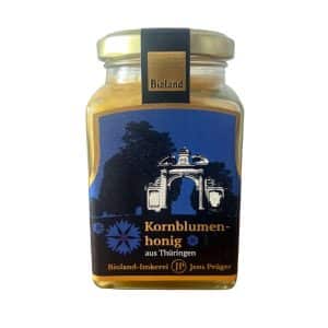 Glas Bio-Kornblumenhonig von Imkerei Jens Prüger – goldgelber Honig aus Kornblüten mit mild-aromatischem Geschmack.