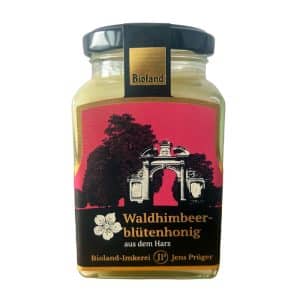 Glas Bio-Waldhimbeerblütenhonig von Imkerei Jens Prüger – heller Blütenhonig mit feinem Himbeeraroma aus regionaler Imkerei.